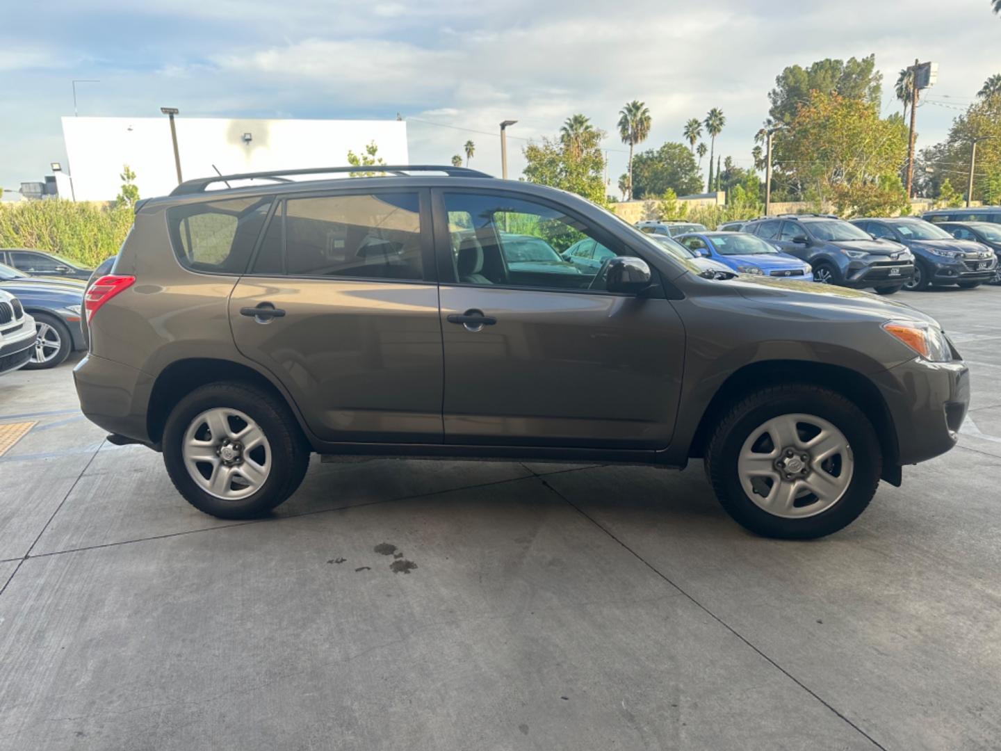 2012 Gray Toyota RAV4 Base I4 2WD with 3rd Row (2T3KF4DVXCW) with an 2.4L L4 DOHC 16V engine, 4-Speed Automatic transmission, located at 30 S. Berkeley Avenue, Pasadena, CA, 91107, (626) 248-7567, 34.145447, -118.109398 - Crown City Motors is a used “Buy Here Pay Here” car dealer in Pasadena CA. “Buy Here Pay Here” financing, means that when you purchase your vehicle from our dealership, that you make the payments to the dealership as well. We do not need the banks approval to get you approved for a used auto - Photo#5